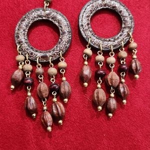 Earrings with beads and leather.